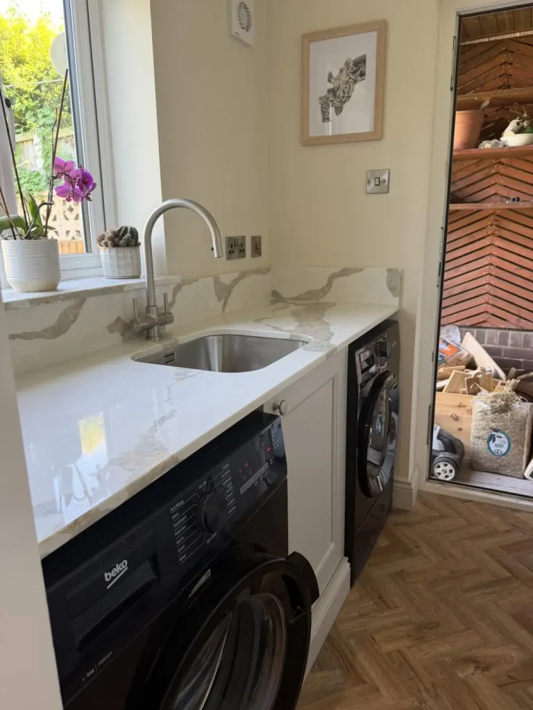 The finished utility room with quartz worktop and undermounted sink